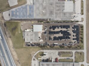 An Ariel view of a company with road on left side